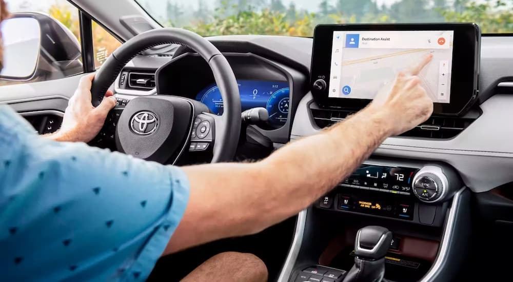 Interior of a 2023 Toyota RAV4 at a used car dealer