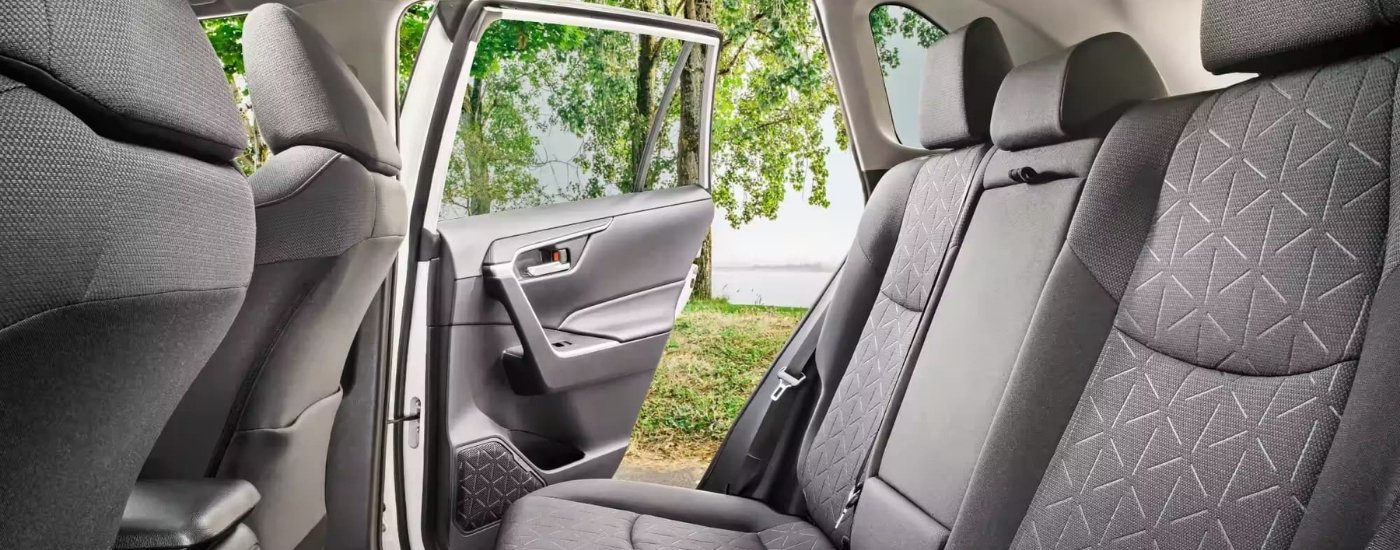 Open door on a 2023 Toyota RAV4 for sale near Clarksville.