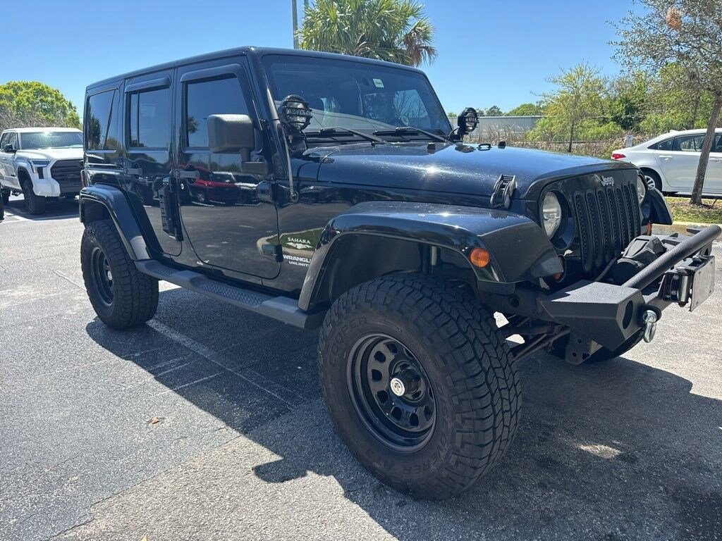 Used 2011 Jeep Wrangler Unlimited Sahara SUV