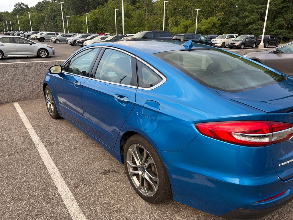 Used 2019 Ford Fusion Hybrid Titanium with VIN 3FA6P0RU6KR129770 for sale in Bedford, OH