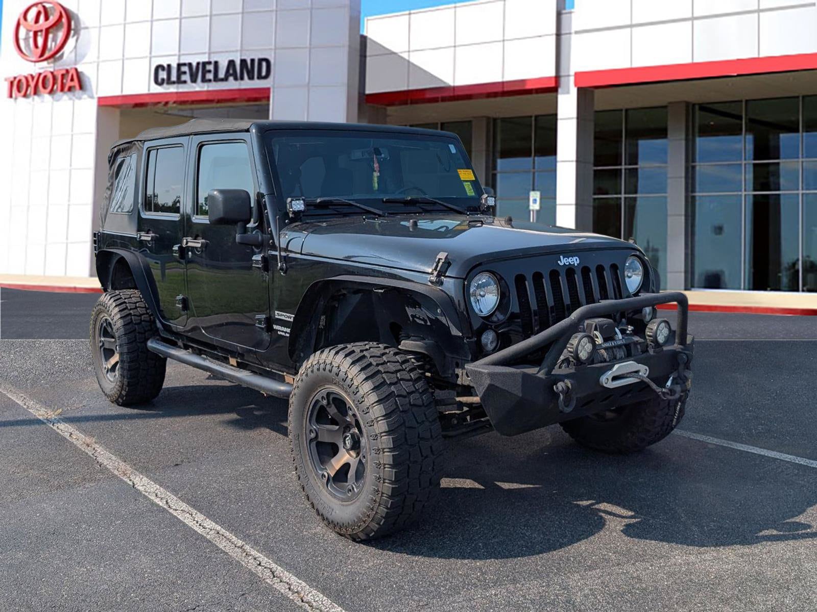 Used 2015 Jeep Wrangler Unlimited Sport with VIN 1C4BJWDG6FL697827 for sale in Mcdonald, TN