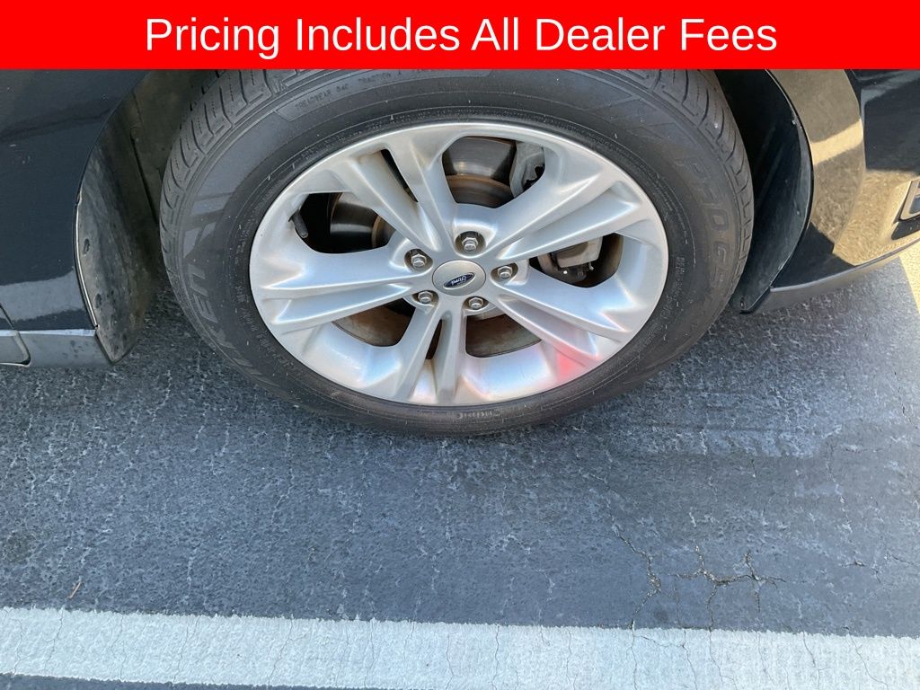 Used 2016 Ford Taurus SEL with VIN 1FAHP2E88GG112805 for sale in Greer, SC