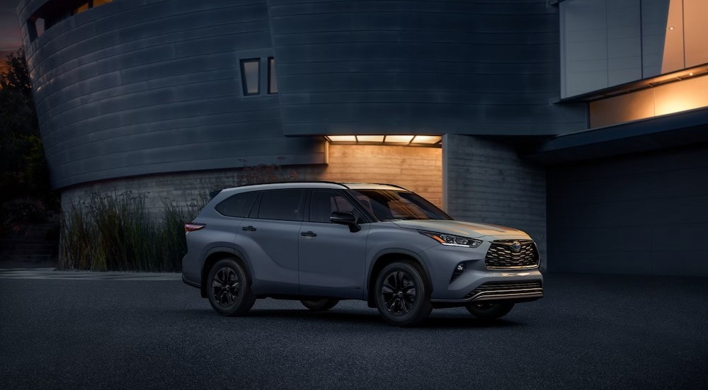 A white 2024 Toyota Highlander Hybrid XLE is shown parked after viewing a Toyota Highlander for sale in New York City.