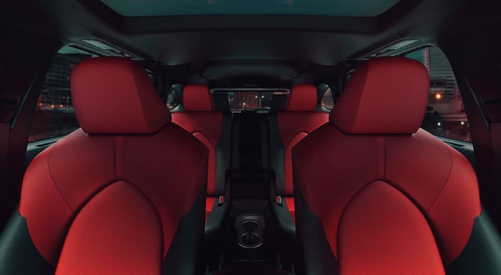Toyota%20Highlander%20for%20sale%20in%20New%20York%20City%20-%202024%20Toyota%20Highlander%20XSE%20-%20Red.jpg The black and red interior in a 2024 Toyota Highlander XSE is shown.