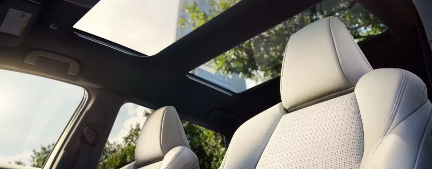 The sunroof and leather seats are shown in a 2023 Toyota bZ4X for sale.