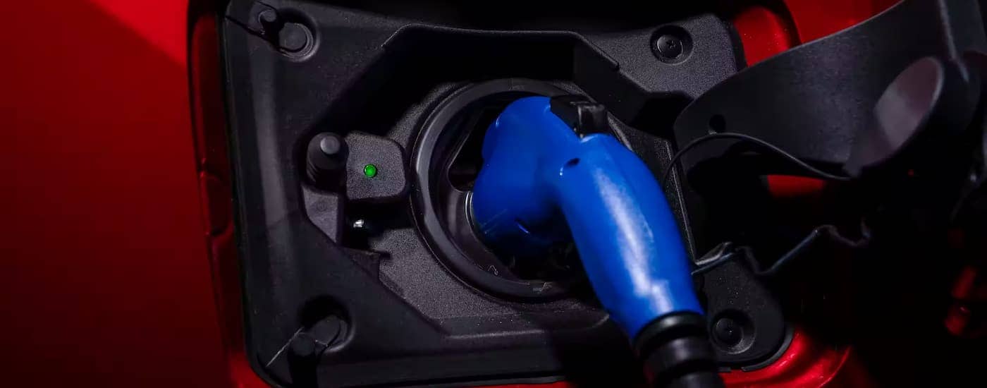 A close up of the charging port of a 2023 Toyota RAV4 Prime XSE is shown.