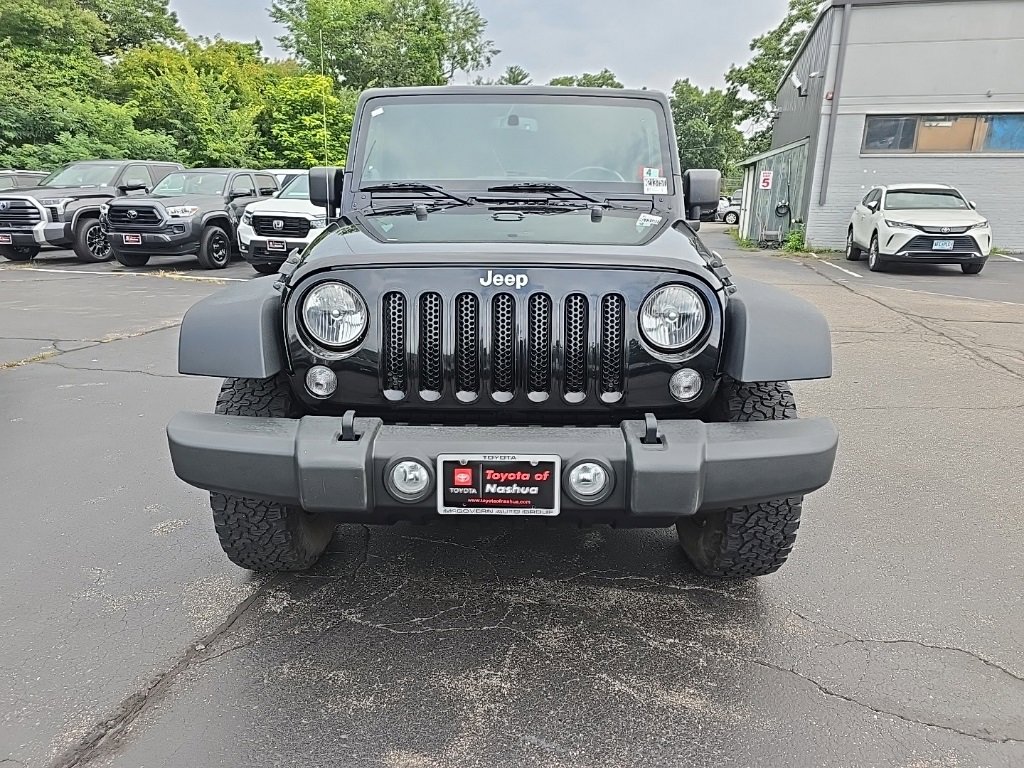 Used 2014 Jeep Wrangler Unlimited Sport with VIN 1C4BJWDG5EL144195 for sale in Nashua, NH