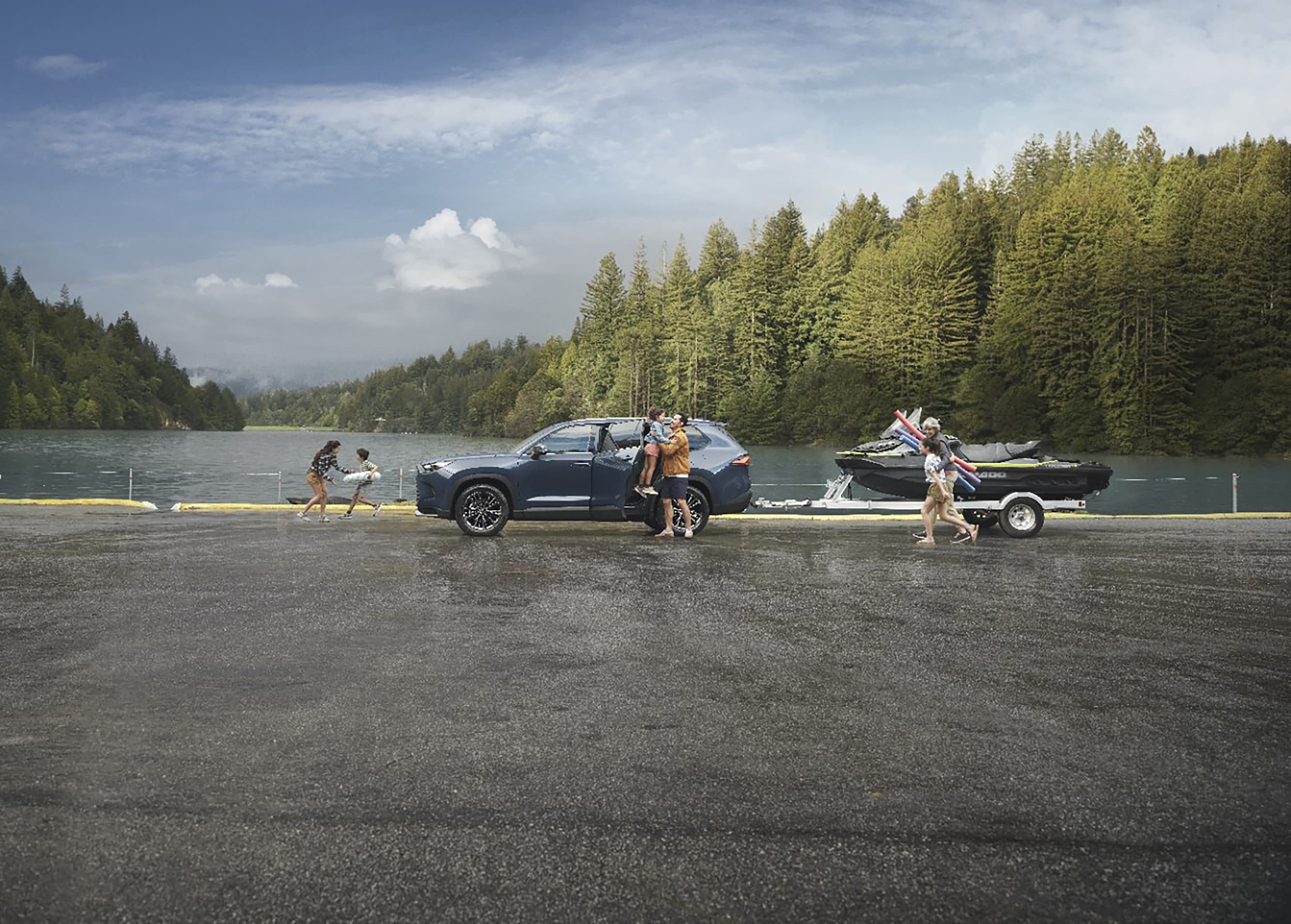 Toyota Grand Highlander Hybrid towing a jet ski