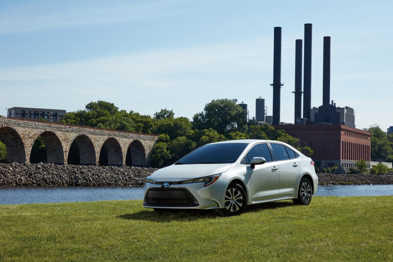 Toyota Corolla Hybrid by a river