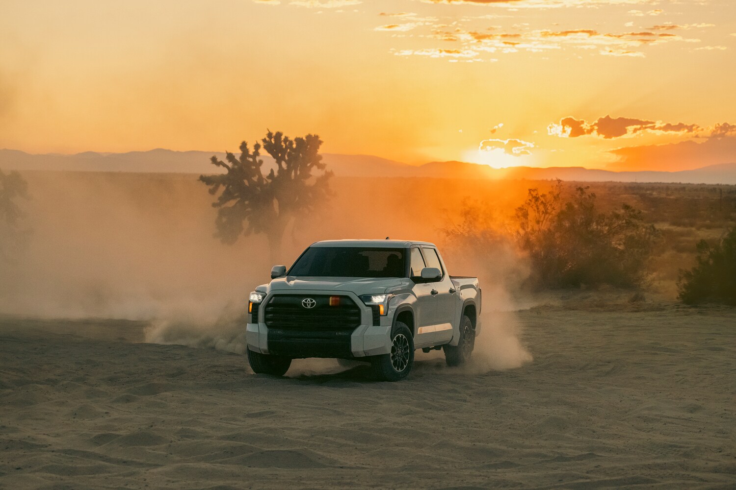  2026 Toyota Tundra Hybrid driving in sand