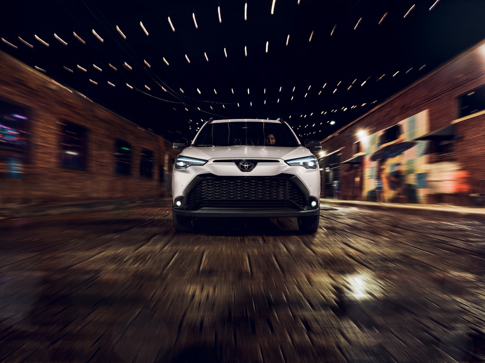 Toyota Corolla Cross Hybrid driving at night
