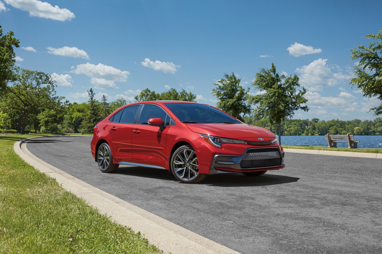 Toyota Corolla Hybrid driving through park