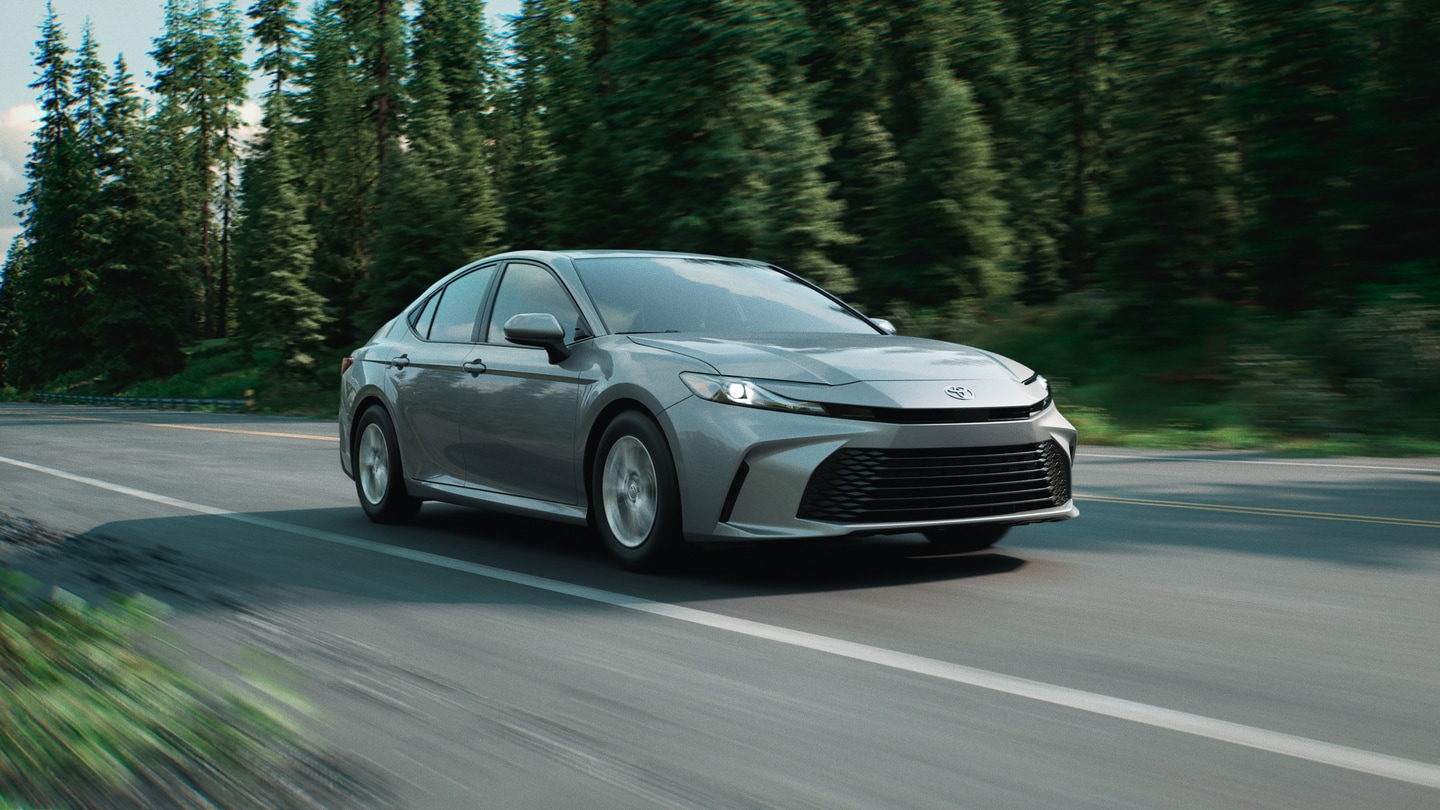  Toyota Camry driving through town