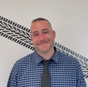 Staff member Adam Monteiro from ID_2feb715cf1c9