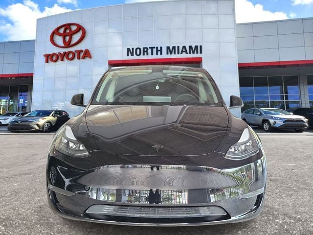 Used 2024 Tesla Model Y Long Range with VIN 7SAYGDED6RF186680 for sale in Miami, FL