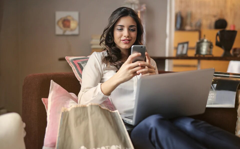 photo-of-a-woman-using-her-smartphone.webp