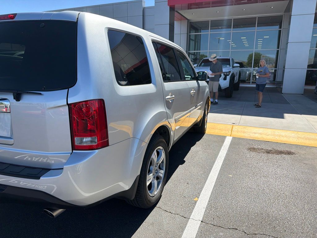 Used 2014 Honda Pilot EX-L with VIN 5FNYF3H5XEB021708 for sale in Surprise, AZ
