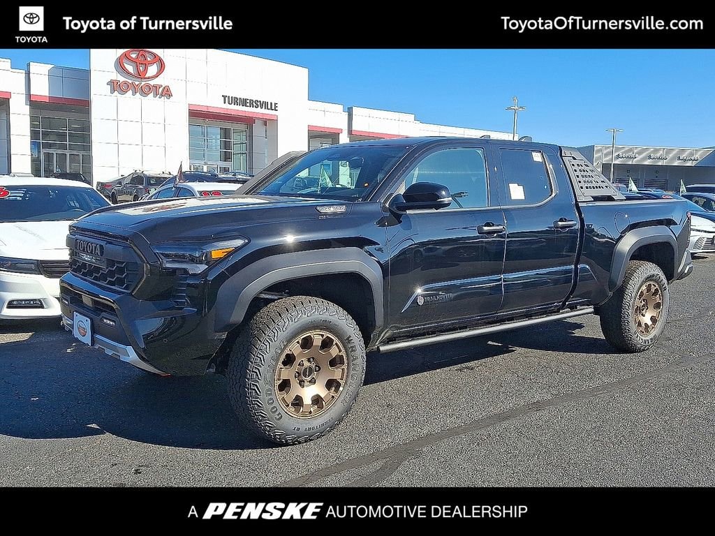 New 2025 Toyota Tacoma i-FORCE MAX Trailhunter 4X4 DBL CAB LB HV