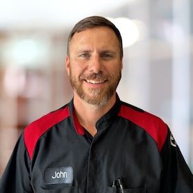 Staff member John Tomlinson from ID_94396fb35c3d