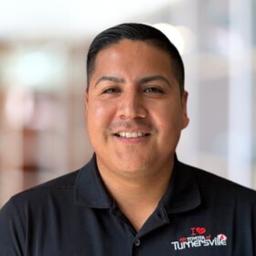 Staff member Carlos Espinoza from ID_08702b3c6593