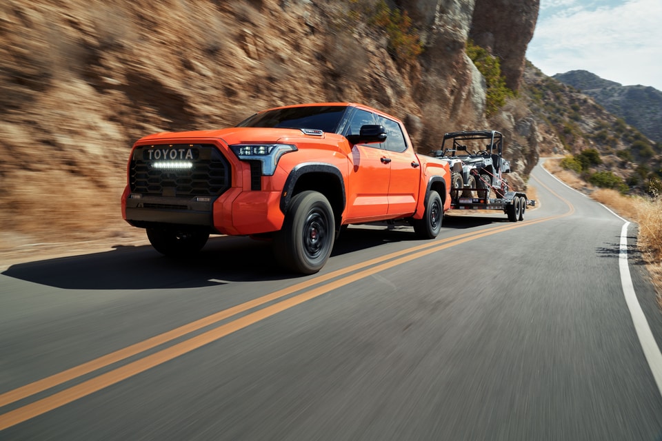 2023 Toyota Tundra towing multiple ATVs