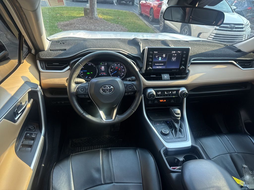 Used 2021 Toyota RAV4 XLE with VIN 4T3RWRFV9MU033304 for sale in Northfield, Minnesota