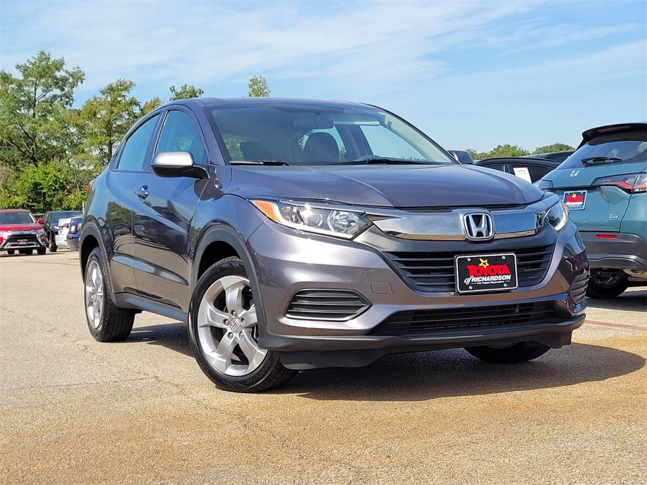 Used 2021 Honda HR-V LX with VIN 3CZRU5H36MM703199 for sale in Richardson, TX