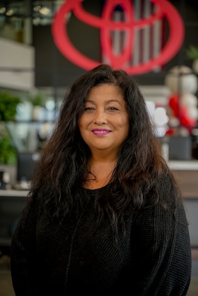 Staff member Aurora Blake from ID_ca324d691ae5