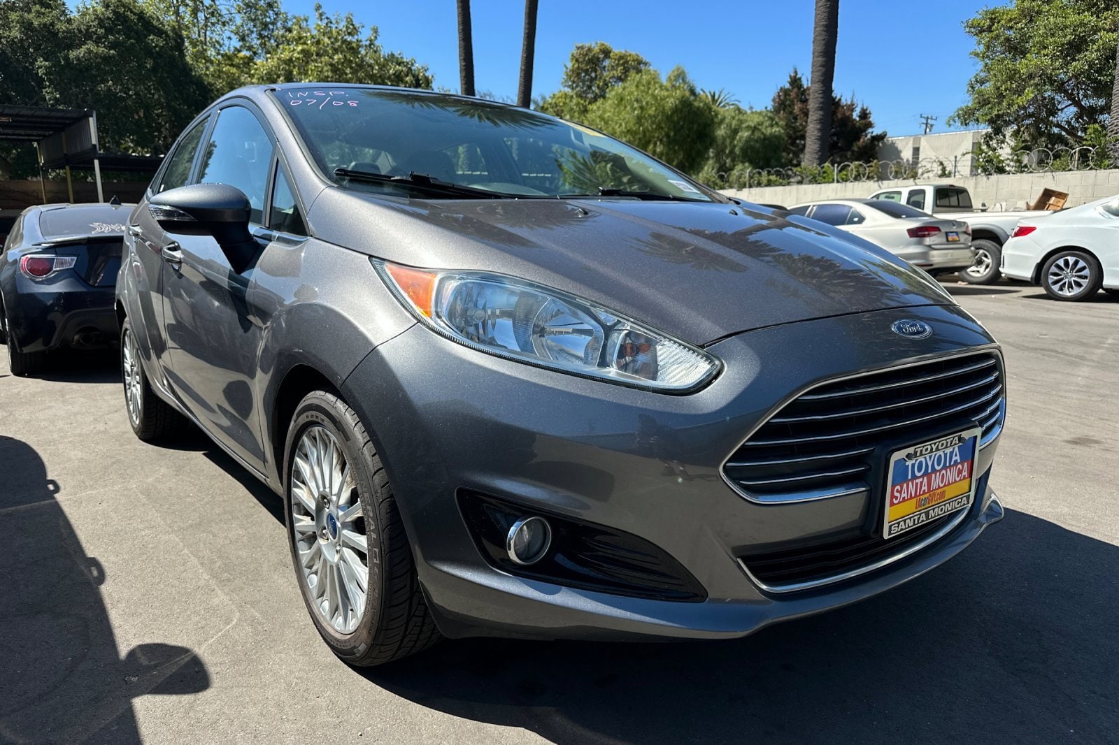 Used 2014 Ford Fiesta Titanium with VIN 3FADP4CJ8EM180153 for sale in Santa Monica, CA