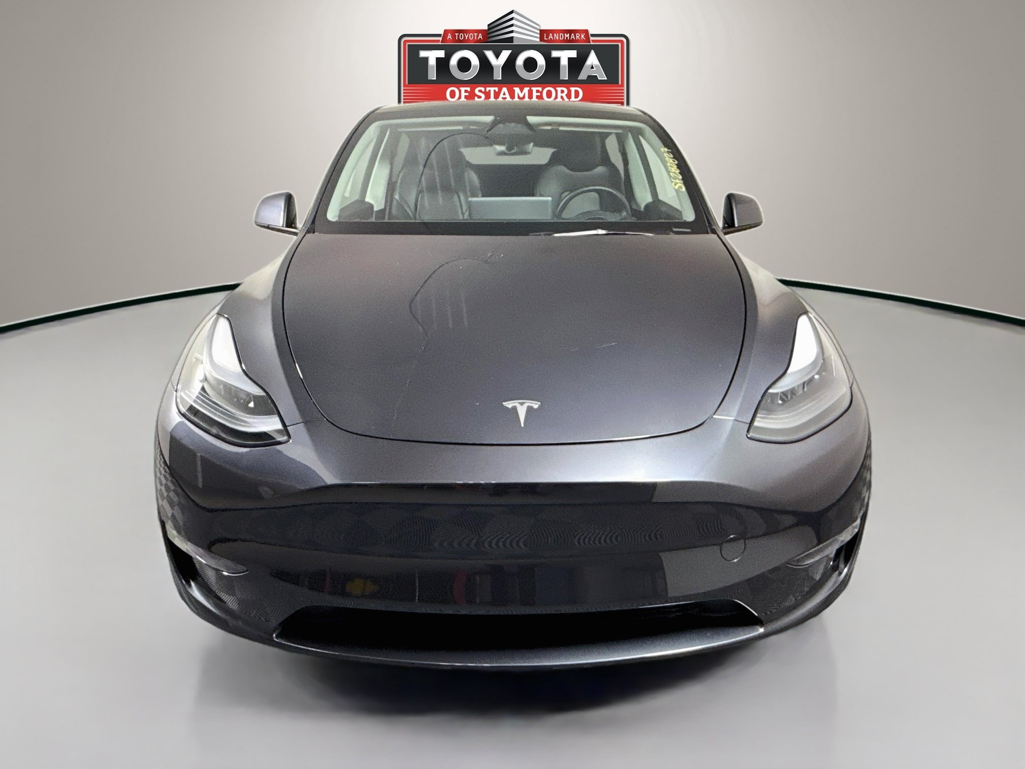Used 2025 Tesla Model Y Long Range with VIN 7SAYGDEEXSF282827 for sale in Stamford, CT