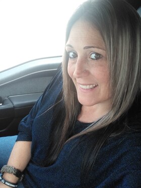 Staff member Lisa Raymond from ID_822f58353b6c