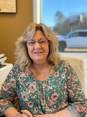 Staff member DEBBIE TRAVIS from 78c25a428621