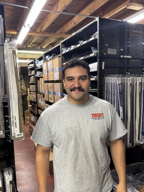 Staff member Justin Ayala from 2042b51eee47