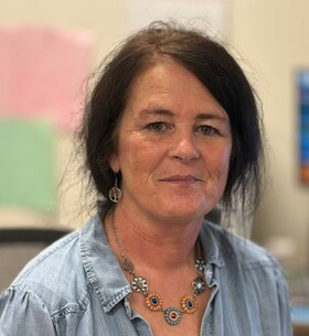 Staff member Terri Collins from ID_7e4c9b8bad2f
