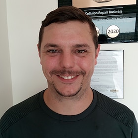 Staff member TJ Hughes from ID_2b97d0c7e751