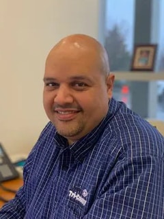 Staff member Andy Fred from ID_b48041147ebd