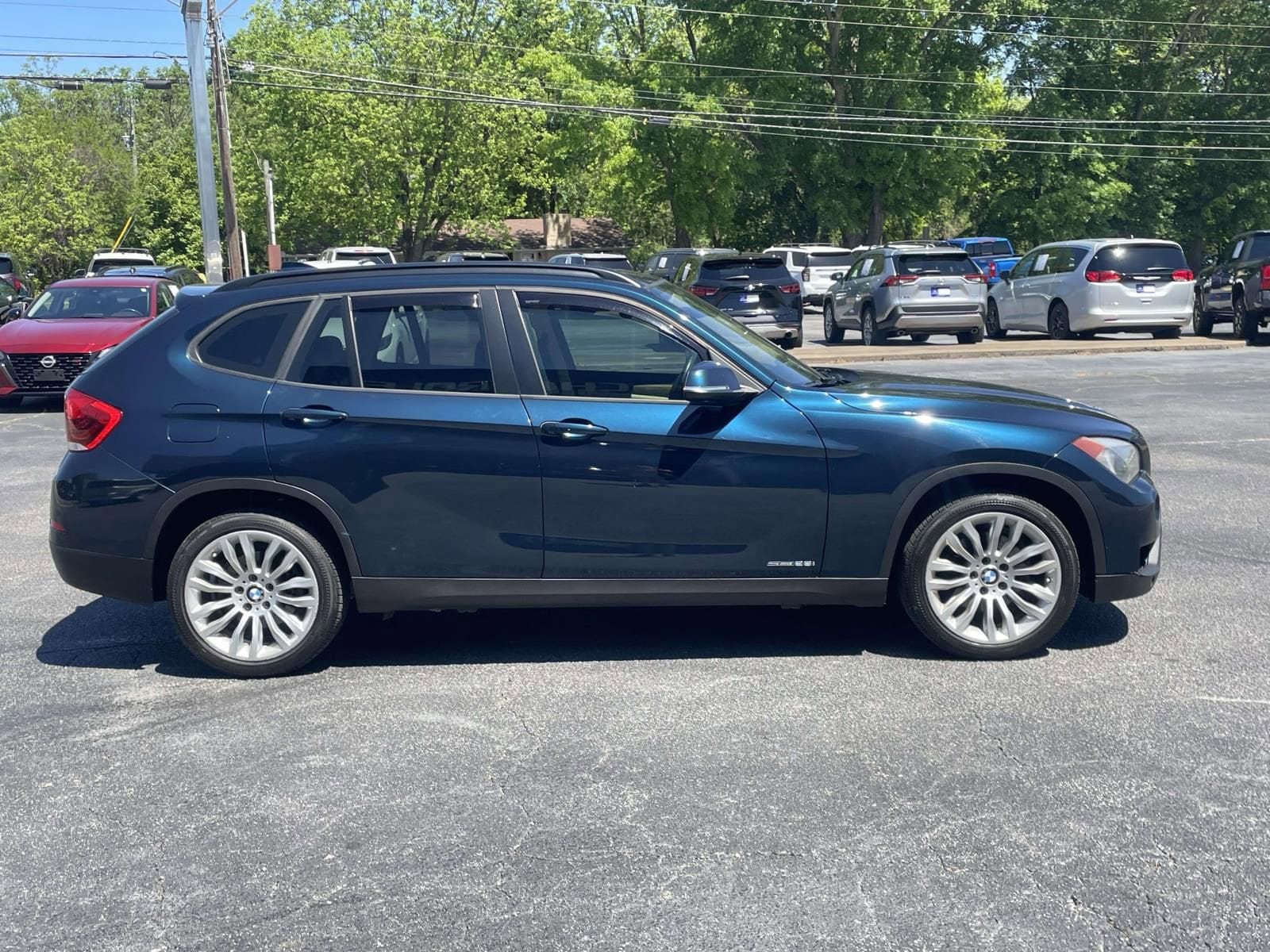 Used 2014 BMW X1 28i with VIN WBAVM1C59EVW55031 for sale in Royston, GA