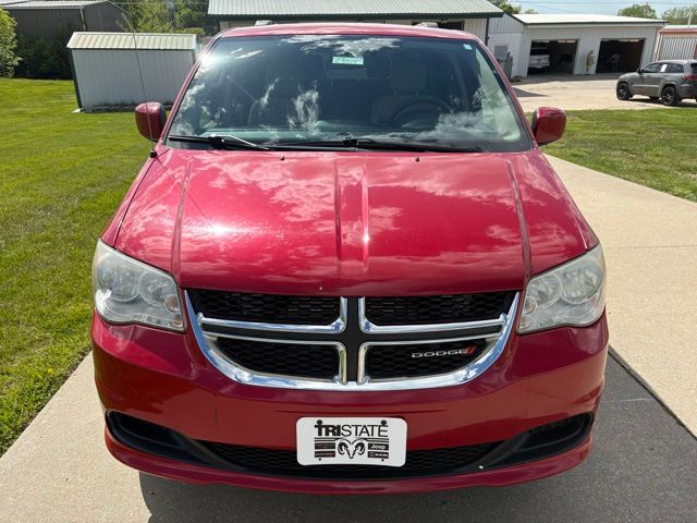 Used 2014 Dodge Grand Caravan SXT with VIN 2C4RDGCG6ER213335 for sale in Kansas City