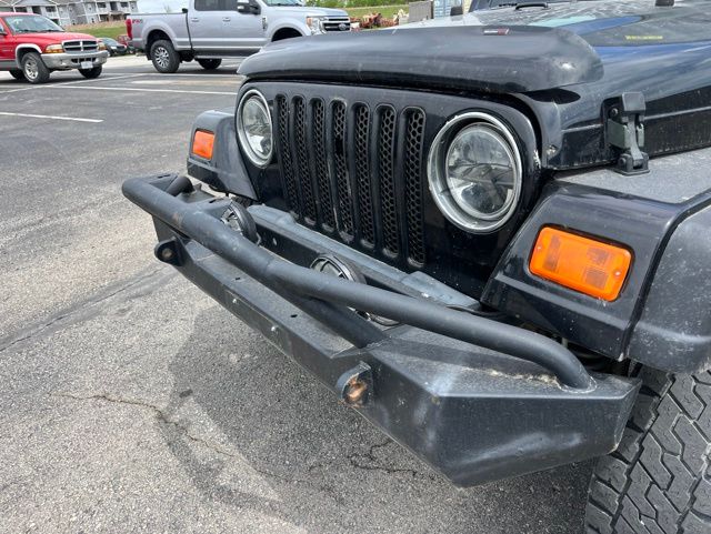 Used 2005 Jeep Wrangler X with VIN 1J4FA39S75P325590 for sale in Kansas City