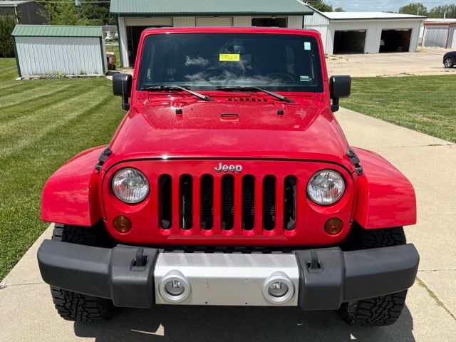 Used 2013 Jeep Wrangler Unlimited Sahara with VIN 1C4BJWEG2DL692569 for sale in Maryville, MO