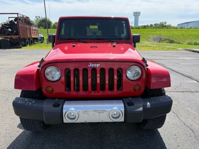 Used 2013 Jeep Wrangler Unlimited Sahara with VIN 1C4BJWEG2DL692569 for sale in Kansas City