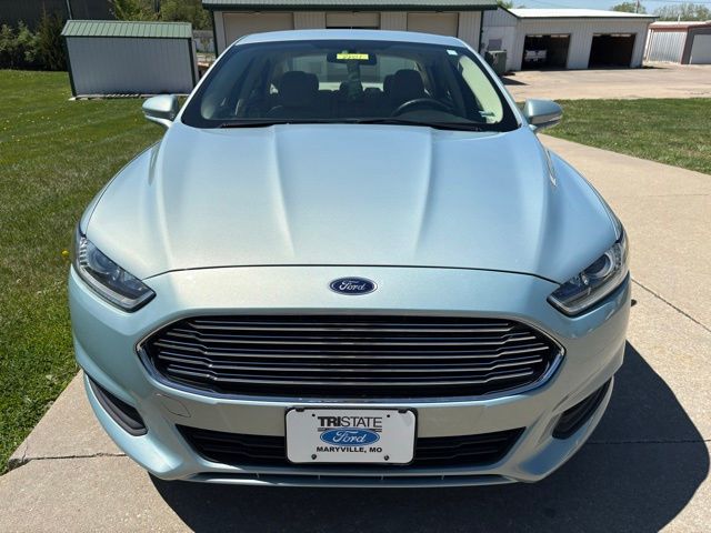 Used 2014 Ford Fusion SE Hybrid with VIN 3FA6P0LU4ER211977 for sale in Kansas City