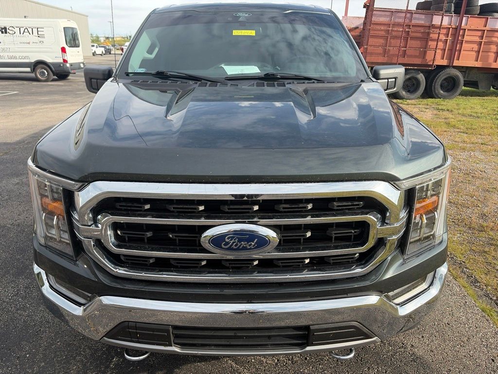 Used 2021 Ford F-150 XLT with VIN 1FTFW1E57MKD01541 for sale in Kansas City