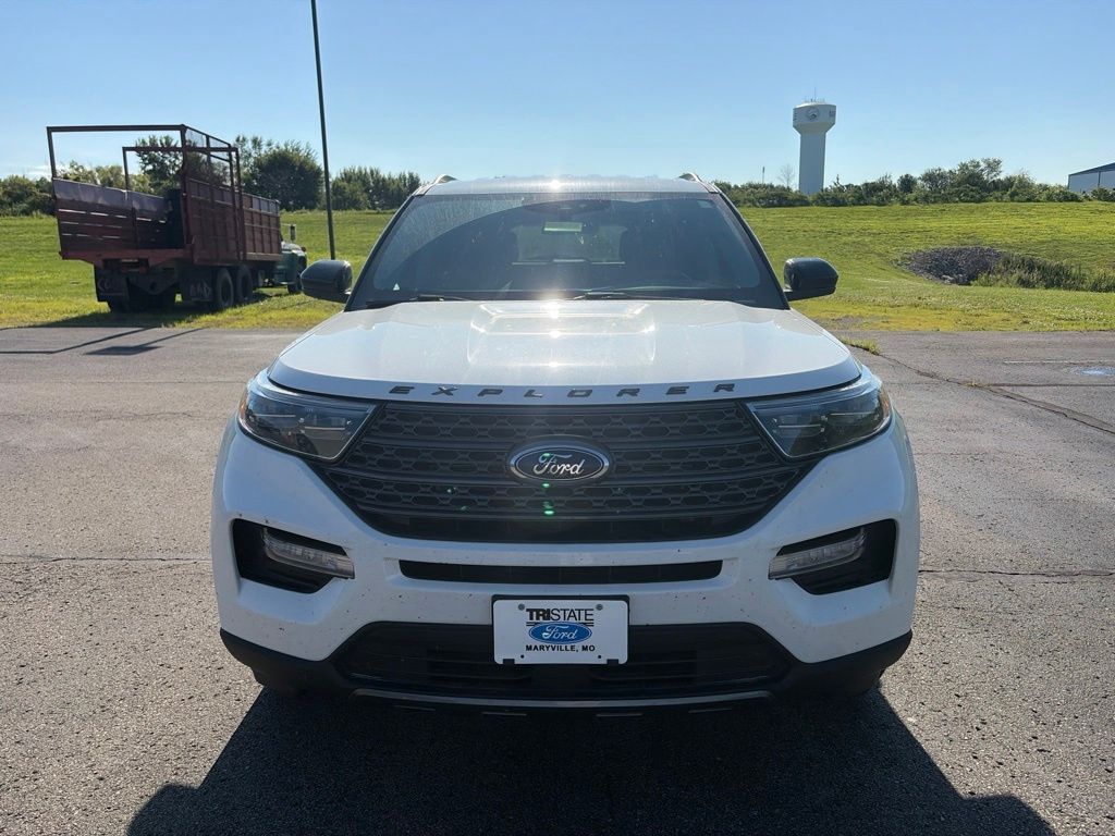 Used 2022 Ford Explorer XLT with VIN 1FMSK8DH5NGC49664 for sale in Kansas City