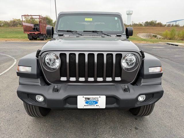 Used 2023 Jeep Wrangler 2-Door Sport S with VIN 1C4GJXAN6PW669959 for sale in Kansas City