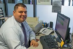 Staff member Cesar Maciel from ID_5d3bf2a4b8f9