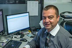 Staff member Carlos Quintanilla from ID_5d3bf2a4b8f9
