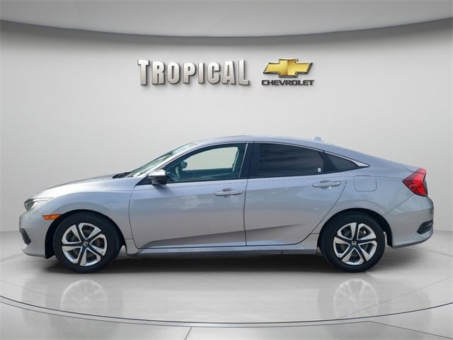 Used 2018 Honda Civic LX with VIN 2HGFC2F55JH580232 for sale in Miami Shores, FL