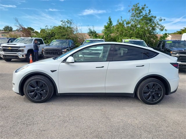 Used 2023 Tesla Model Y Long Range with VIN 7SAYGDEE6PA150460 for sale in Miami Shores, FL