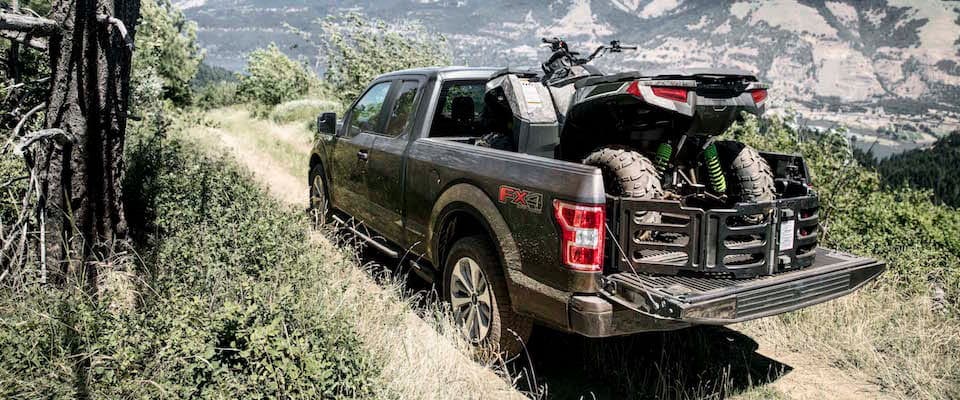 2019 Ford F-150 A 2019 Ford F-150 pulling an ATV through the mountains